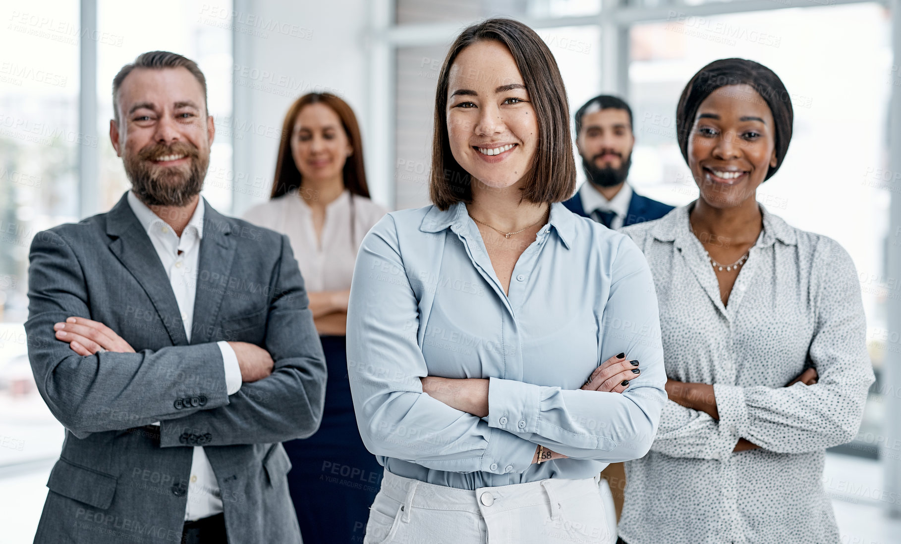 Buy stock photo Portrait of a group of businesspeople standing together in an office