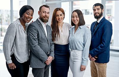 Buy stock photo Portrait of a group of businesspeople standing together in an office