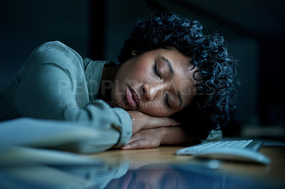 Buy stock photo Shot of young businesswoman sleeping at her desk during a late night in a modern office