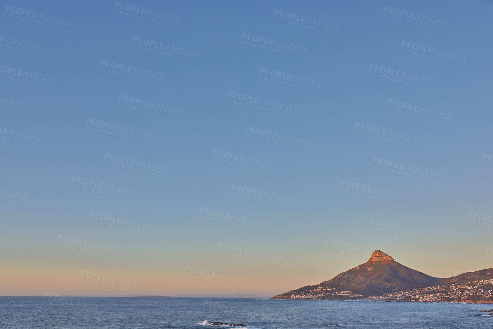 Buy stock photo Panorama of table Mountain in Cape Town against a blue sky on a quiet morning with copy space. Banner of clear ocean and views of Lions Head in South Africa. Tranquil, serene, quiet nature in harmony