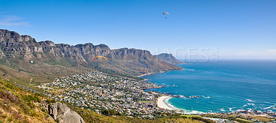 Buy stock photo Landscape mountain panorama, sea and coastal city with residential buildings in famous travel or tourism destination. Copy space and scenic Twelve Apostles with blue sky in Cape Town, South Africa