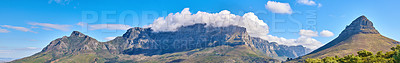 Buy stock photo Panoramic landscape of the majestic Table Mountain and Lions Head in Cape Town, Western Cape. A cloudscape sky with copy space over large mountainous and hilly terrain in peaceful nature