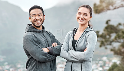 Buy stock photo Portrait of a sporty young man and woman exercising outdoors
