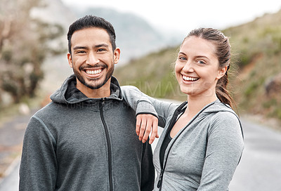 Buy stock photo Portrait of a sporty young man and woman exercising outdoors