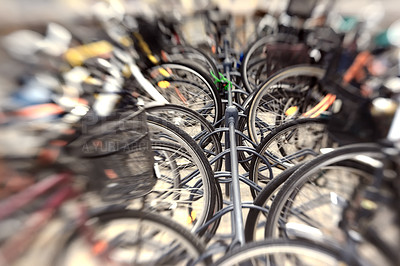 Buy stock photo A lens blurred photo of a group of bikes