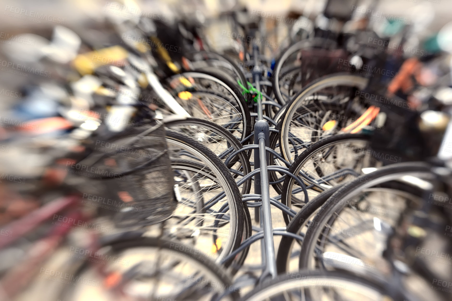 Buy stock photo A lens blurred photo of a group of bikes