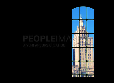 Buy stock photo View from inside big window grid looking out at a traditional skyscraper building on blue sky copy space. Dark room with light part of a gothic vintage tower. Architecture of a tall built structure