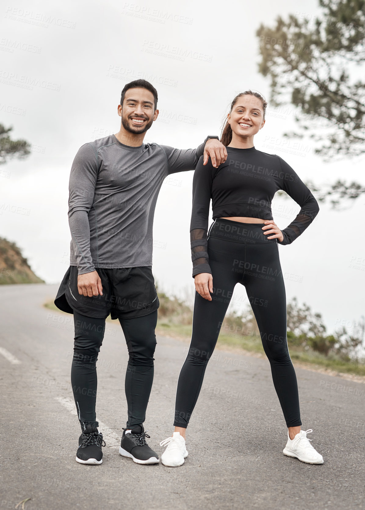 Buy stock photo Full length portrait of two young athletes standing together after their run outdoors