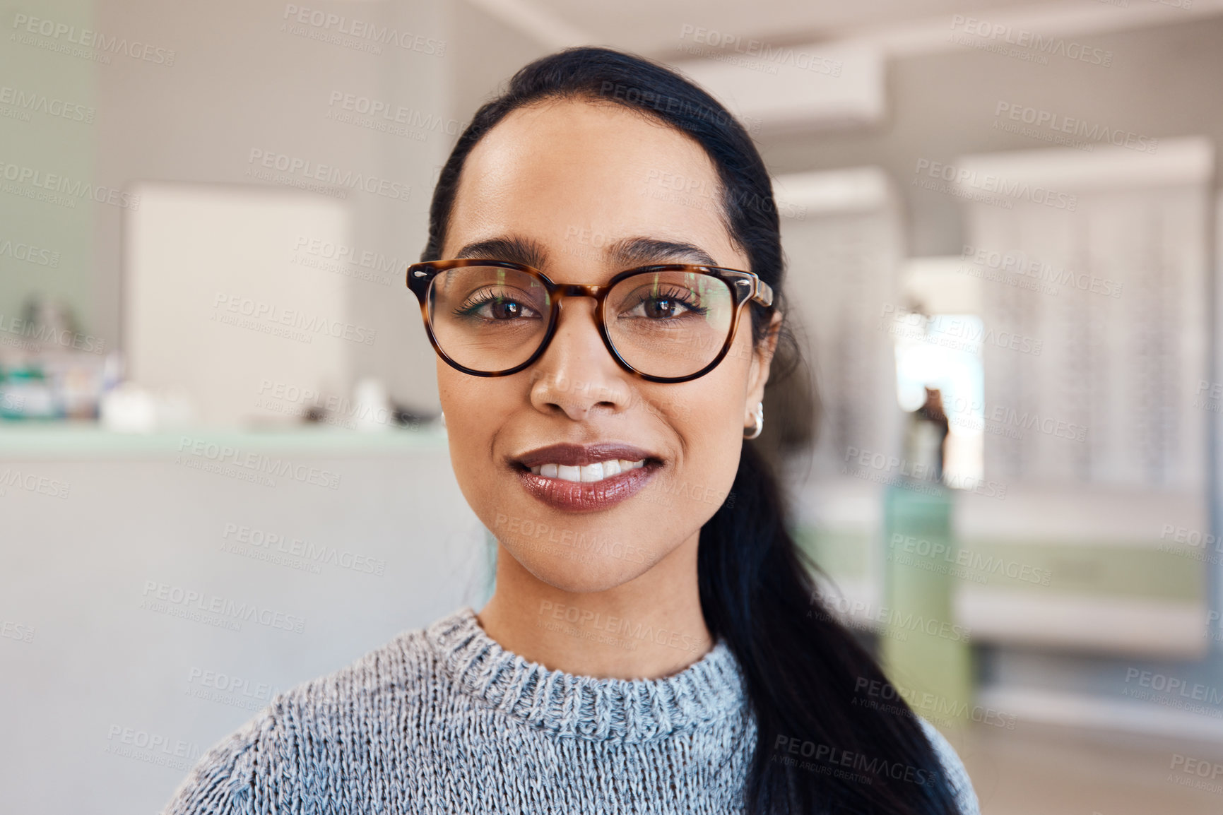 Buy stock photo New glasses at optometrist checkup, buying eyewear and fitting frames at a shop. Closeup portrait of the face of female doing eyecare, examining eyesight and standing at optician consultation