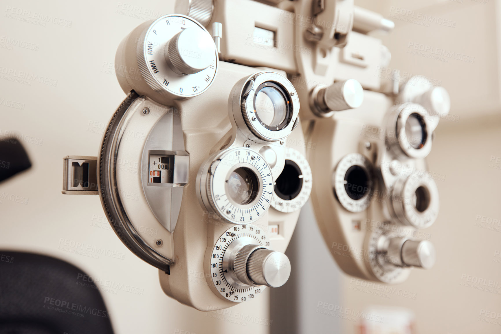 Buy stock photo Shot of an optical refractor in an optometrist’s office