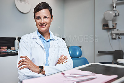 Buy stock photo Portrait of a confident young woman working in a dentist’s office