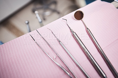 Buy stock photo Shot of various dental tools on a table