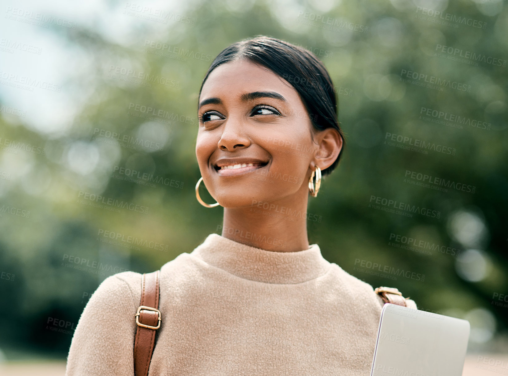 Buy stock photo Cropped portrait shot of an attractive young female student outside on campus