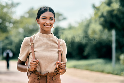 Buy stock photo Portrait shot of an attractive young female student outside on campus