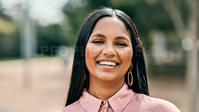 Buy stock photo Cropped portrait shot of an attractive young female student outside on campus
