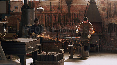 Buy stock photo Blacksmith, workshop and sparks with metal, men and equipment for professional craft. Protection, gloves and industrial in factory with anvil for metalwork, hammer or forge for iron product creation