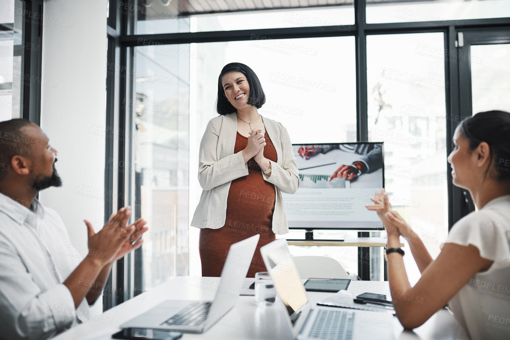 Buy stock photo Meeting, pregnancy and businesswoman with applause in office with presentation for finance revenue statistics. Discussion, clapping hands and pregnant female financial presenter with employees.