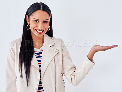 Buy stock photo Portrait, smile and woman with palm for space, mockup or presentation isolated on a white studio background. Face, hand gesture and show advertising, promotion or marketing sales offer for discount