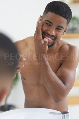 Buy stock photo Happy man, face and beauty with mirror and skincare, hygiene and grooming during morning routine at home. Black male person smile in bathroom, fresh and clean facial with wellness and moisturizing