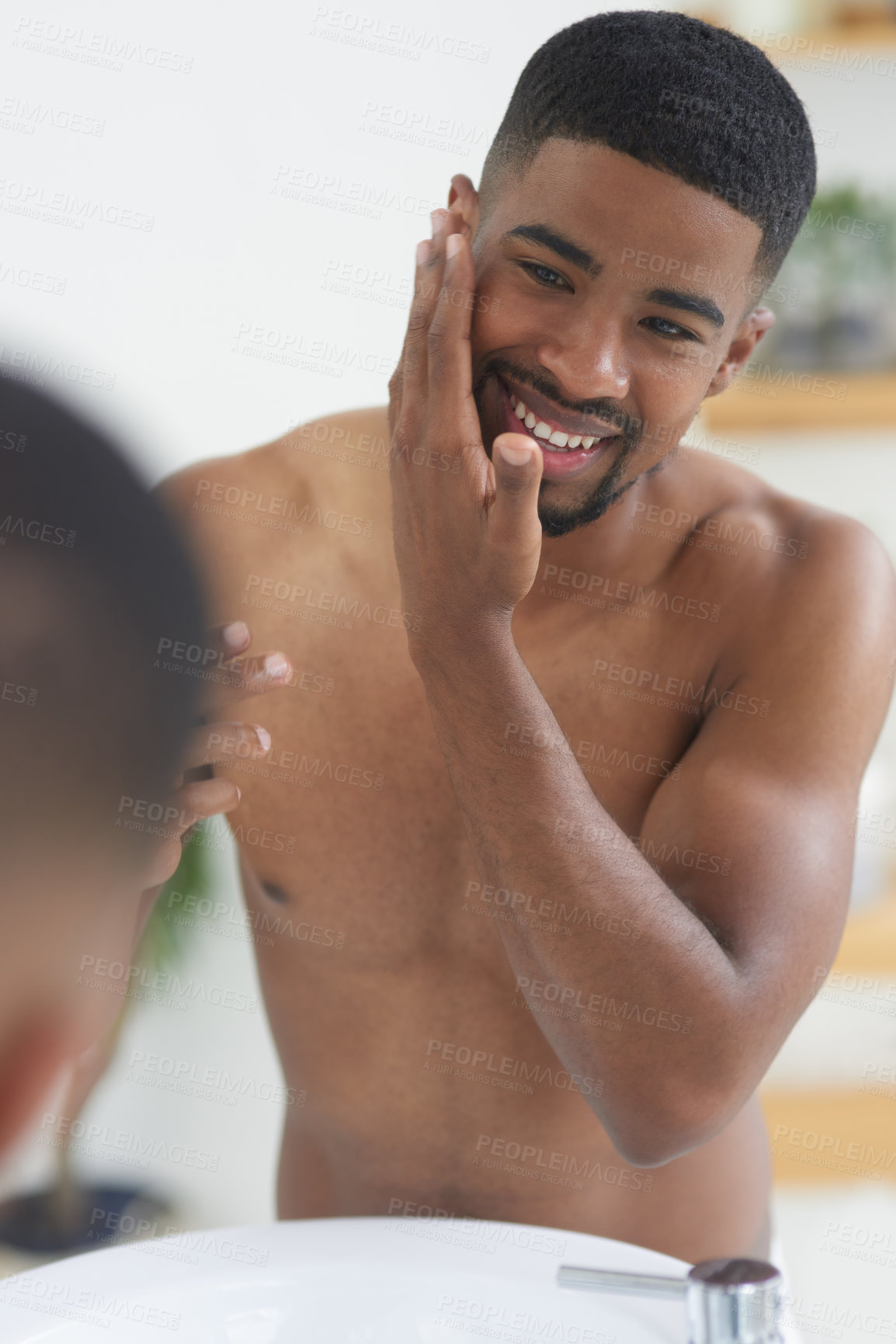 Buy stock photo Happy man, face and beauty with mirror and skincare, hygiene and grooming during morning routine at home. Black male person smile in bathroom, fresh and clean facial with wellness and moisturizing