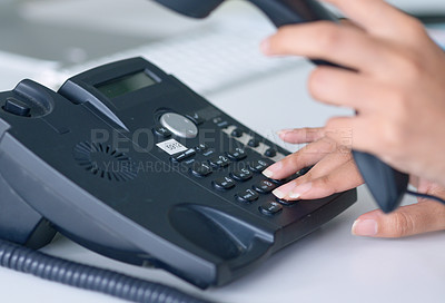 Buy stock photo Telephone, call and closeup on receptionist hands for work conversation, communication or telemarketing. Hand, phone and office secretary calling, crm or administration to contact us on a landline