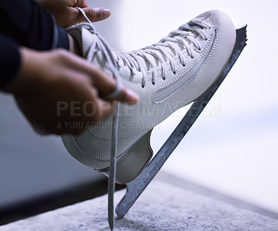 Buy stock photo Sports, shoes and hands of figure skater for training, practice or exercise for competition. Athlete, fitness and preparation for ice skating challenge with boots on snow for creative art performance