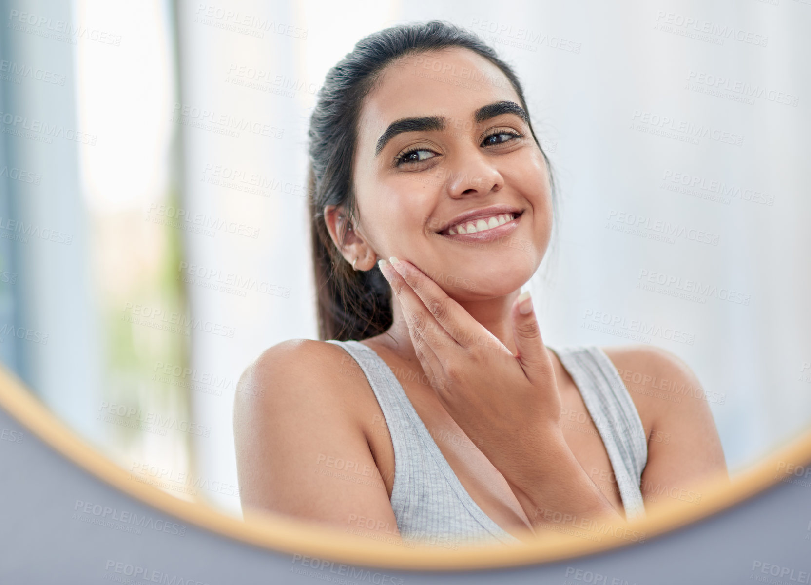 Buy stock photo Beauty, skincare and reflection of woman in mirror of bathroom for cosmetics, skincare or vitamin c. Face, collagen and dermatology with happy person in apartment for antiaging wellness routine