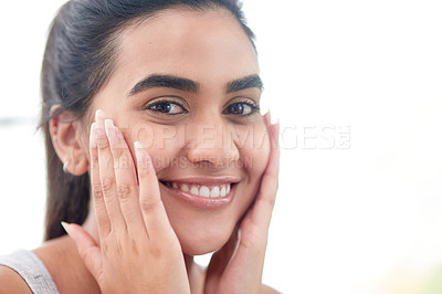 Buy stock photo Shot of a beautiful young woman proudly admiring her skin