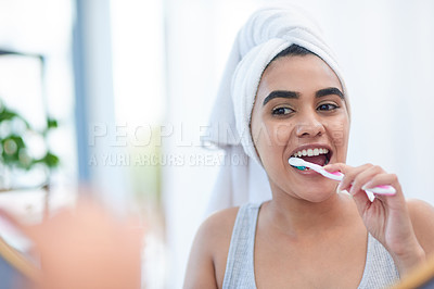 Buy stock photo Toothpaste, woman and toothbrush for cleaning teeth, dental health or morning shower in bathroom. Girl, face in mirror and washing mouth with tooth brush, hygiene and smile for health and wellness