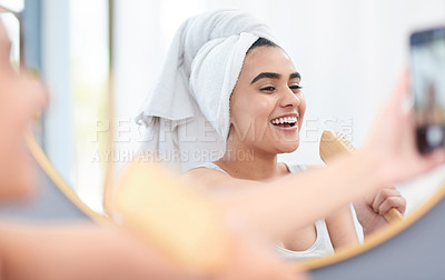 Buy stock photo Young woman recording a video of herself