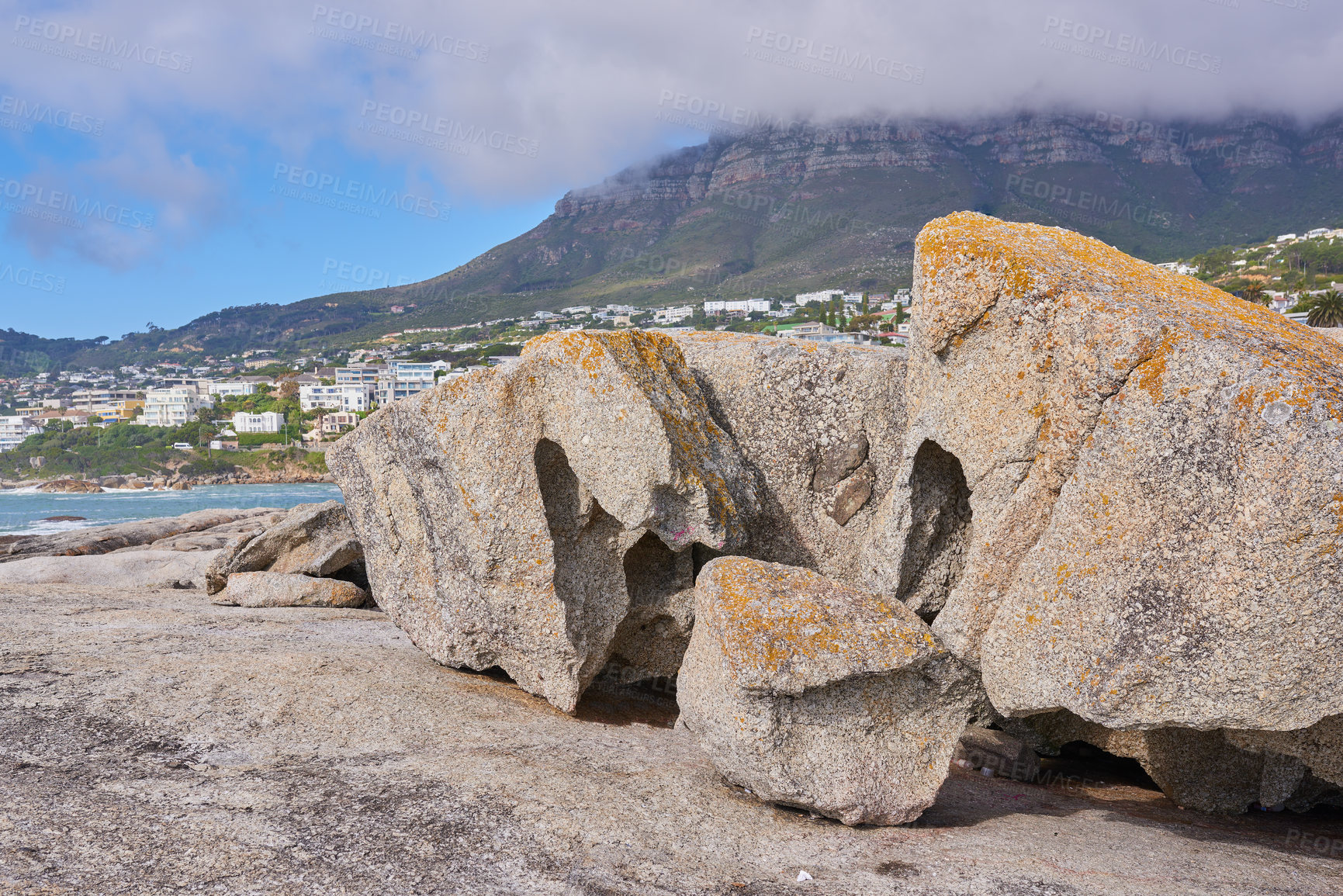 Buy stock photo Boulders on the rocky coast of Western Cape, South Africa, Landscape view of a beautiful mountain and seashore in Cape Town. Natural seaside environment in a popular tourist location for a holiday