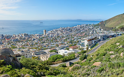 Buy stock photo Panorama landscape view of the city Cape Town in South Africa. Beautiful scenic view of a popular tourist town with greenery and nature during summer. Ocean and residential in the Western Cape