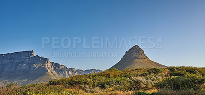 Buy stock photo Copy space, landscape view and mountains of Lions Head and Table Mountain in serene, relaxing nature reserve. Blue sky with copyspace in Cape Town, South Africa of tranquil, local countryside scenery