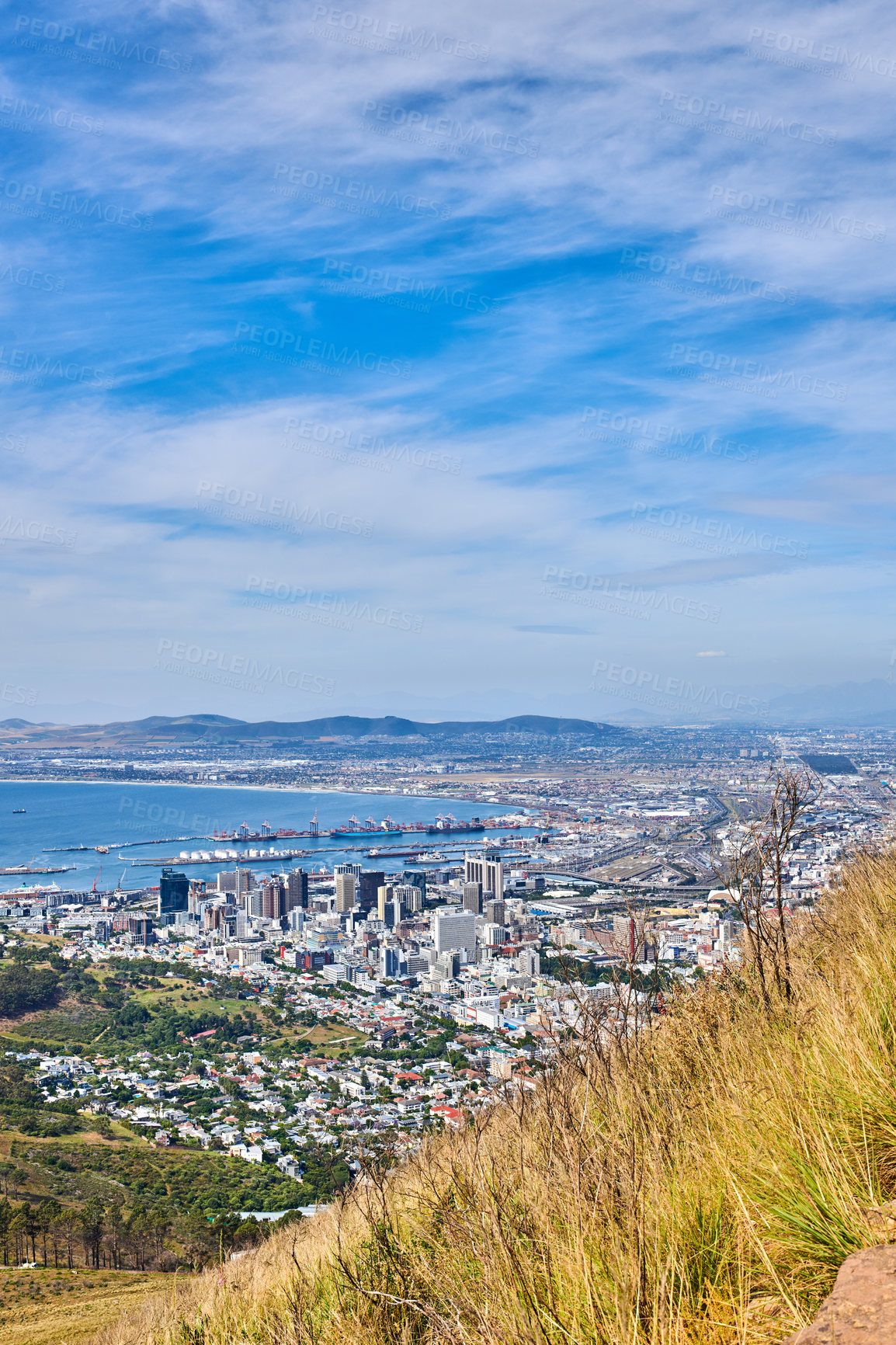 Buy stock photo Landscape view of the city of Cape Town in South Africa. Beautiful scenic view of a popular tourist town with greenery and nature during summer. Ocean and residential in the Western Cape