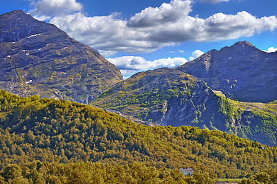 Buy stock photo Landscape view of beautiful mountains in the day. Green bushes in nature on the mountain with hills of life. Big high cliffs like the beauty of the white clouds in the sky.