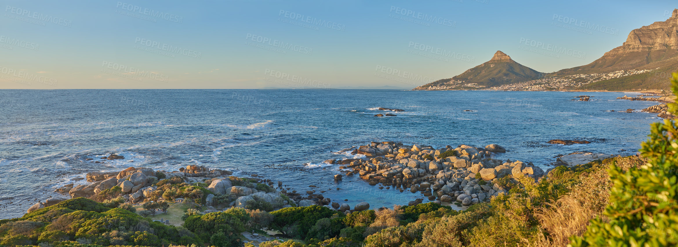 Buy stock photo Panorama of beautiful landscape with views of the ocean and Lions Head in Cape Town at sunset. Banner of a peaceful morning with peaks and landscape in South Africa, tranquil, serene and quiet nature