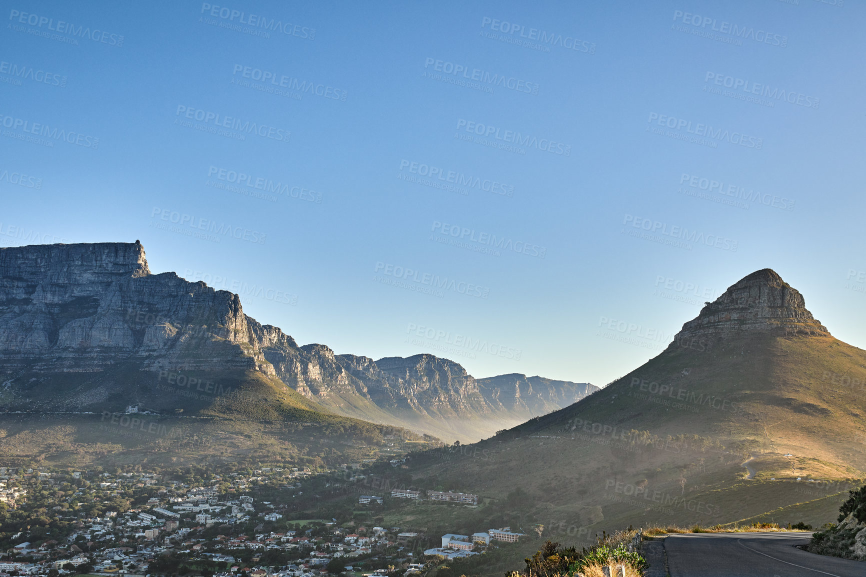 Buy stock photo Mountain background, landscape of Table mountain and suburb with private houses against a blue sky background with copyspace. Beautiful view of vegetation surrounding city in Cape Town, South Africa