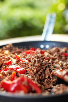 Buy stock photo  Still life Close up view of hot juicy ground beef stewed with tomato sauce, spices, basil, finely chopped vegetables in a frying pan, classic recipe
