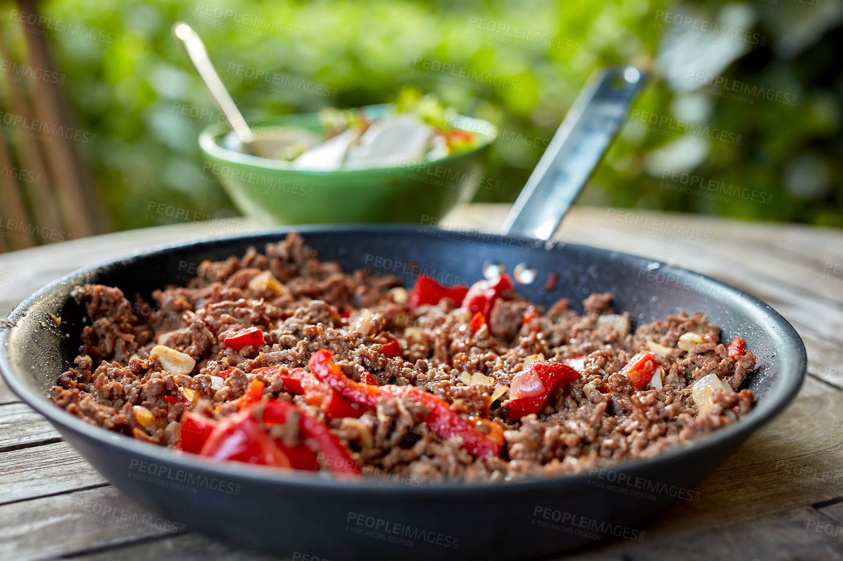 Buy stock photo Closeup of healthy meal with minced beef meat and pepper vegetables in traditional mexican chilli dish served for lunch or dinner. Texture detail of delicious homemade food in a pan on a wooden table