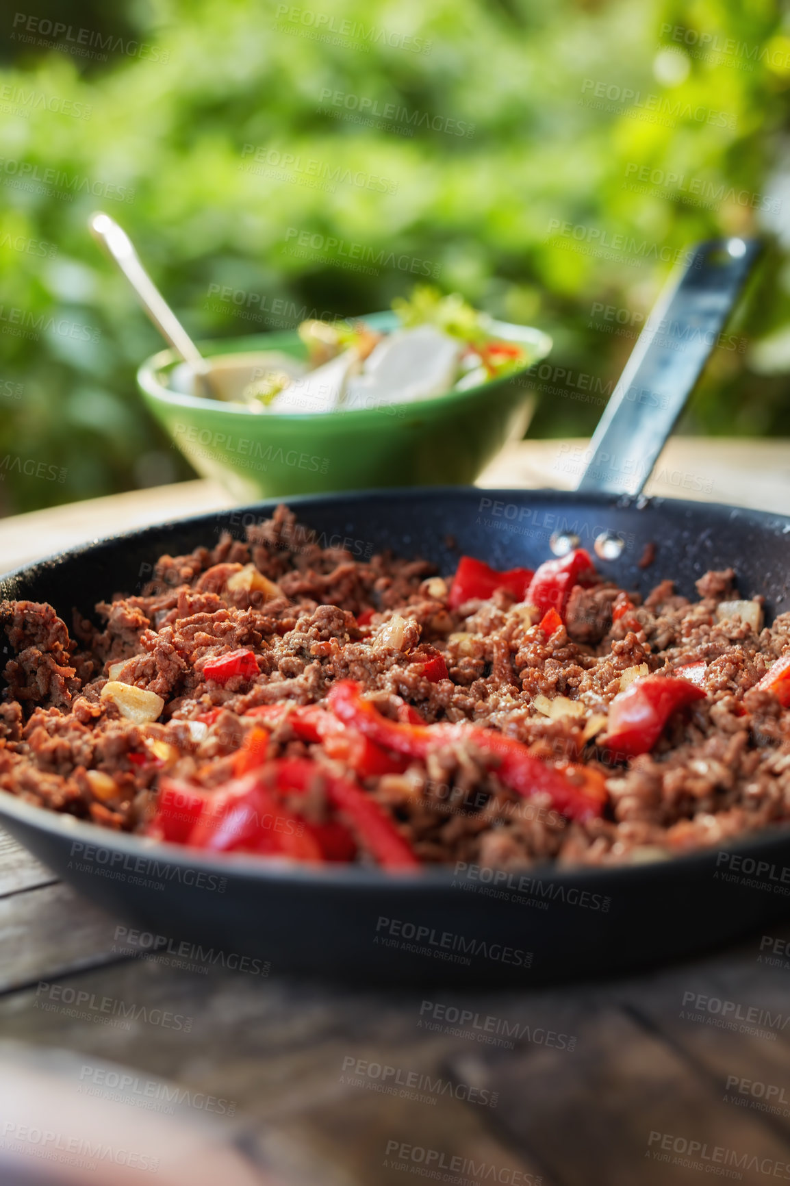 Buy stock photo Close up view of hot juicy ground beef stewed with tomato sauce, spices, basil and finely chopped vegetables in a frying pan, classic recipe. Delicious meal prepared in a restaurant or home kitchen