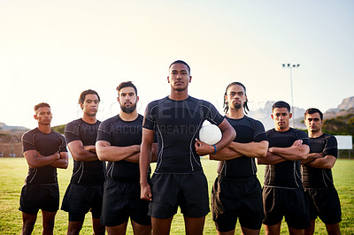 Buy stock photo Cropped portrait of a diverse group of sportsmen standing together before playing rugby during the day