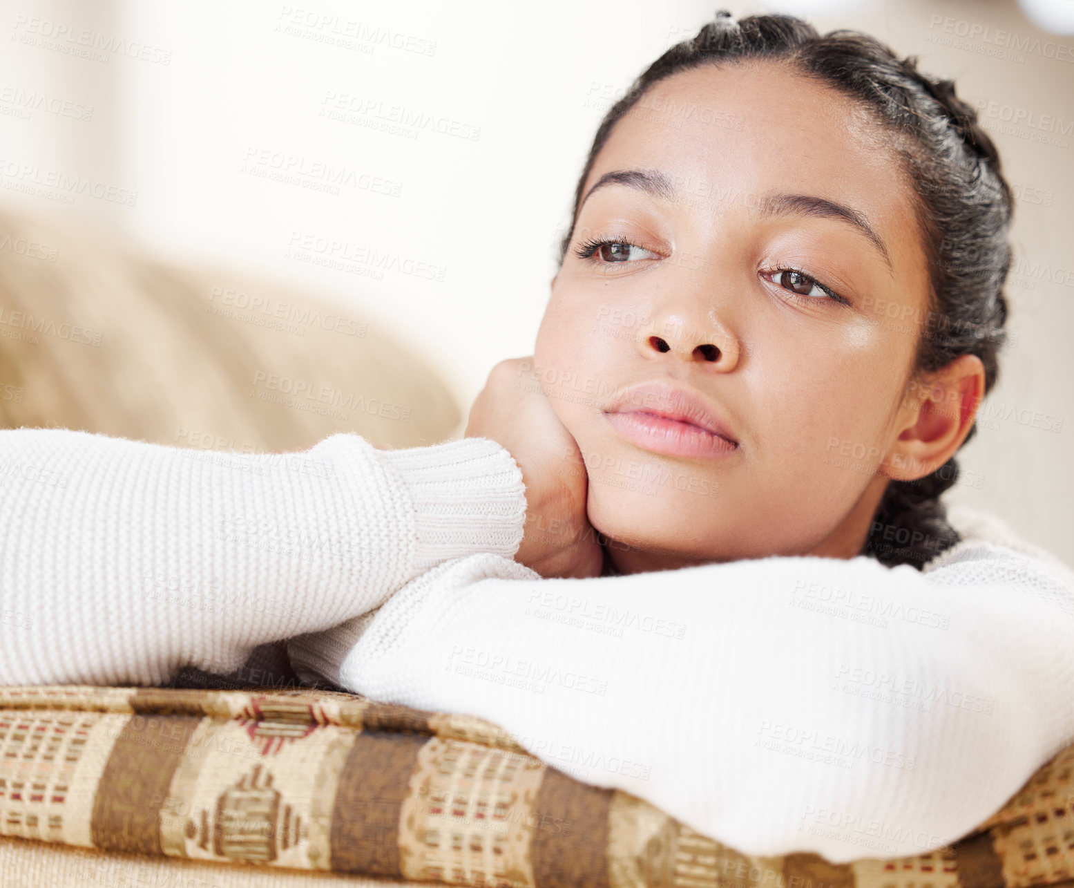 Buy stock photo Shot of a thoughtful on the sofa at home