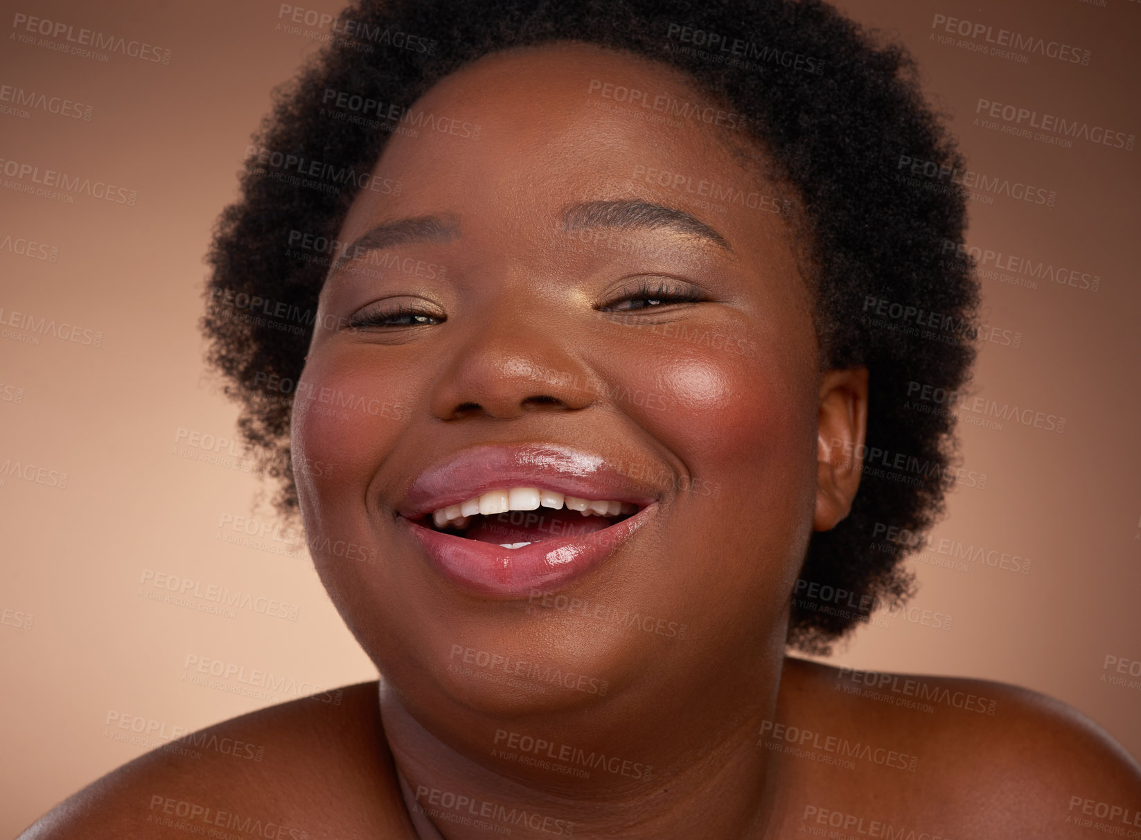 Buy stock photo Happy, portrait and black woman in studio for beauty or skincare with make up, cosmetics and wellness. Person, isolated and beige background with lip balm for glow or self care, plus size and shine.