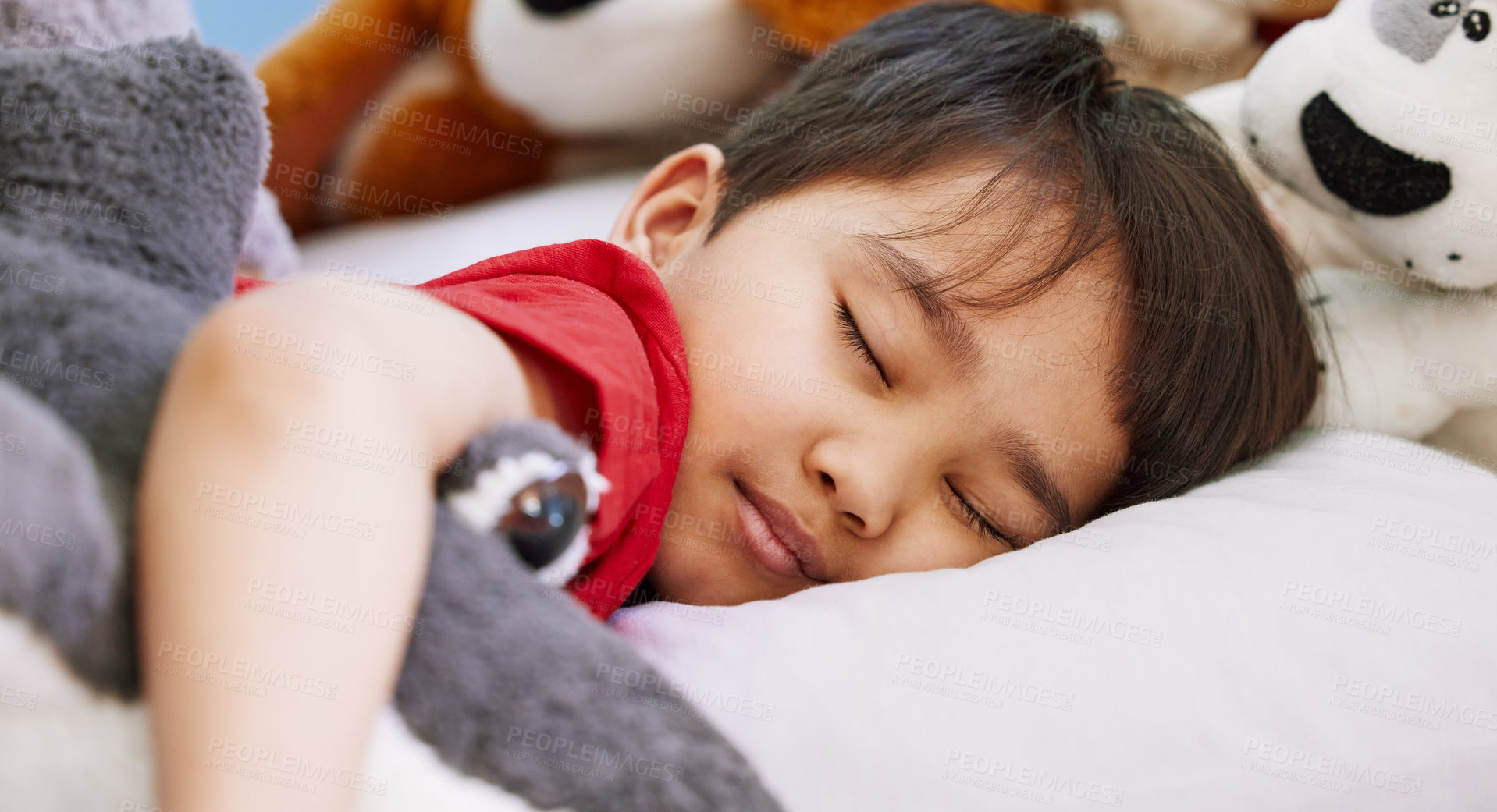 Buy stock photo Asian boy, baby and sleeping in bedroom, home and nursery for peace, calm and dreaming at nap time. Tired, toys or young male kid resting for break, growth and healthy childhood development in house