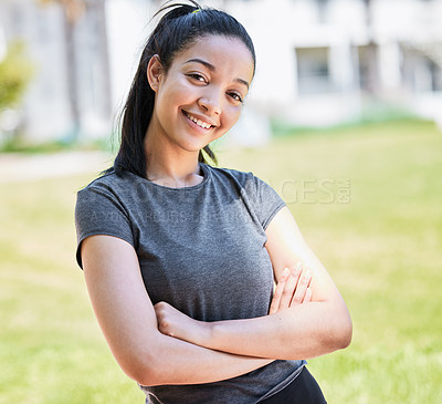 Buy stock photo Portrait of a confident young woman having a workout at the park