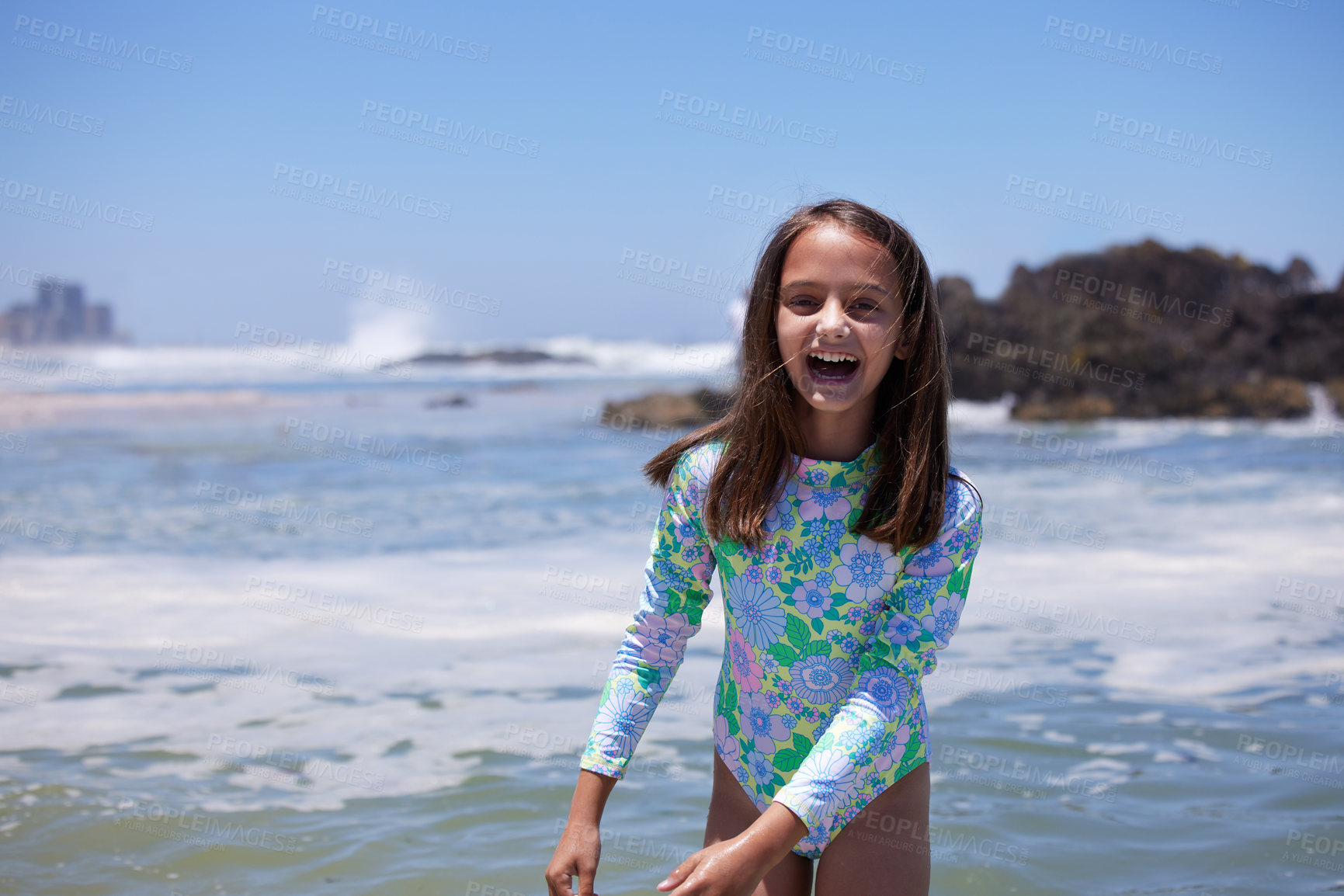 Buy stock photo Shot of an adorable little girl at the beach