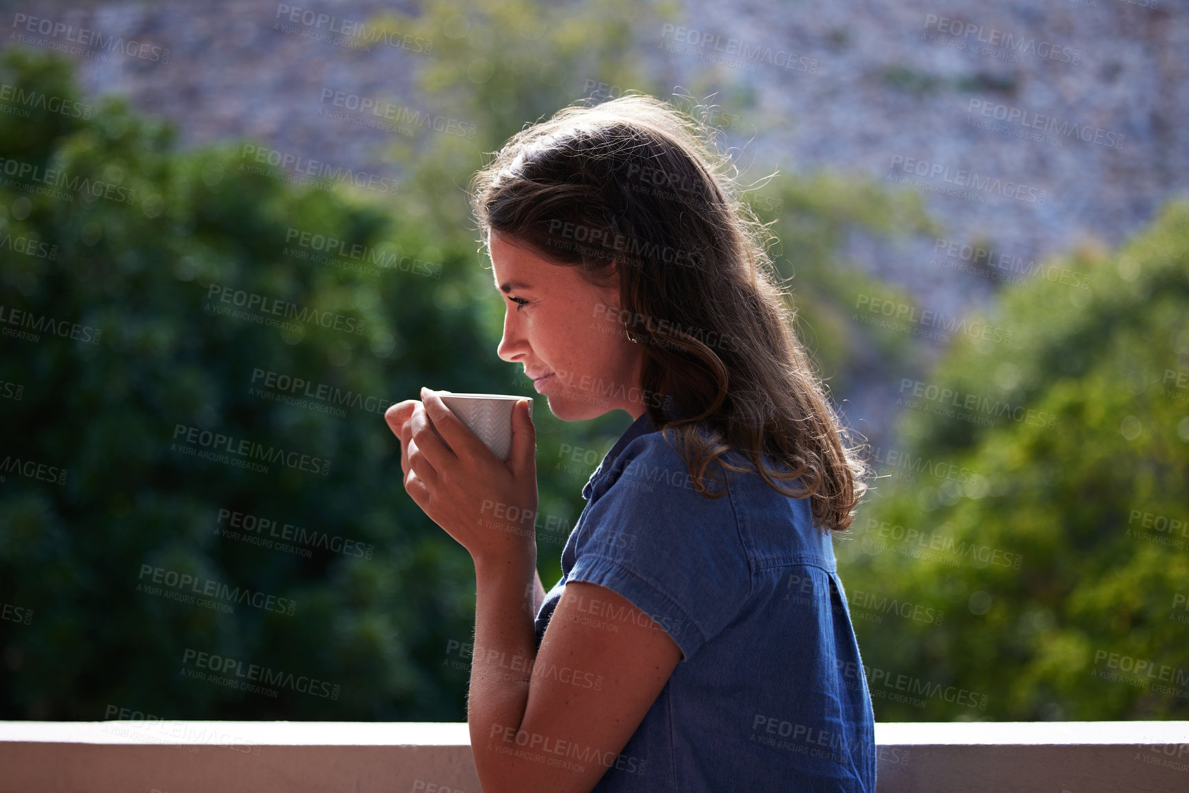 Buy stock photo Profile, woman and thinking with coffee by balcony in house, apartment and home for nutrition, drink and wellness. Vision, calm and happiness for tea, espresso and breakfast outdoor by trees in Peru
