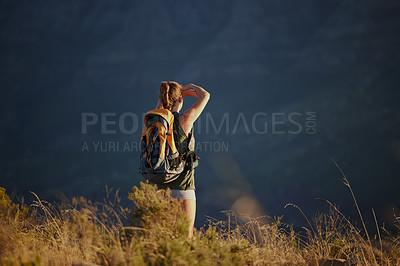 Buy stock photo Hiker, mountain and sky in environment for landscape, nature or adventure for extreme sport, travel and explore. Woman, sitting and cliff for recreation, hiking and journey with backpack in training 