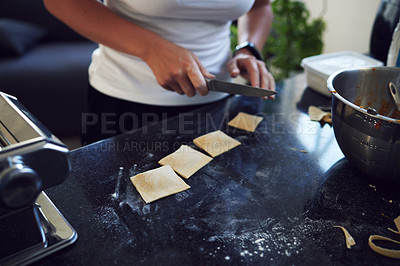 Buy stock photo Person, hands and cooking pasta on kitchen counter with mixing bowl for healthy diet preparation at home. Woman, chef and food with knife in closeup for nutrition, handmade ravioli and balanced meal