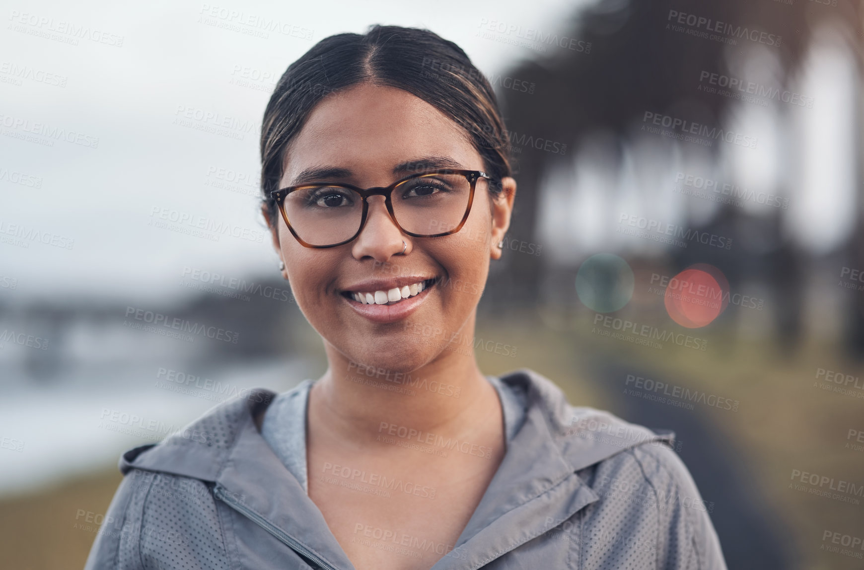 Buy stock photo Cropped shot of a young woman out for a run